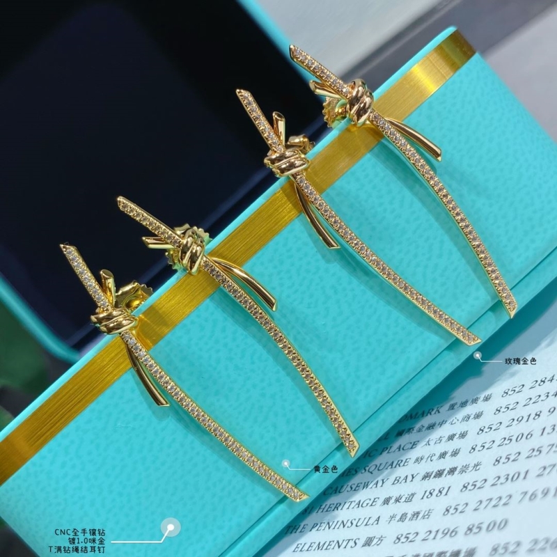 T*f*ny earrings